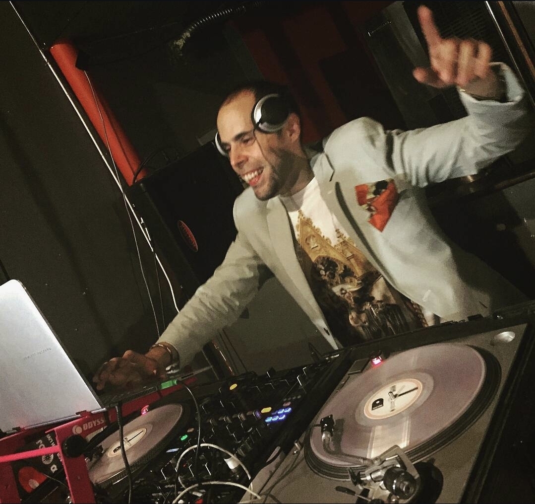 DJ LexNY working the turntables