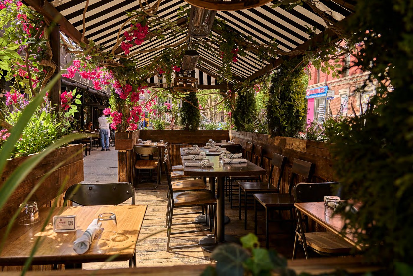 LouLou — flower-covered cabana terrace